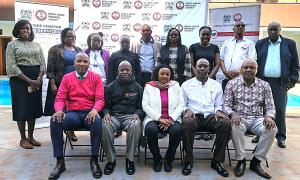 Front Row from left: Mr. Edward Wanjala (Board Member), Mr. Samuel Chemisto, HSC (Ag. CEO), Ms. Margaret Gaitirira (Board Member), Mr. Robert Kungu (Alt. Director to the PS, SD of Industry), Mr. Kirui David Kibett (Board Member). Back row from left; Ms. Roselyne Wachira (Rep, PPRA), Ms. Eunice Mbiti (KETRA), Ms. Rodah A. Ogoma (SCAC), Ms. Janet Kimutai (KETRA), Mr. Silas Owiti (KETRA), Ms. Cecilia Mbothu (SCAC), Ms. Lyndah Waronya (Rep, PPRA), Prof. Solomon Ngahu (NT) and Mr. Daniel Nderi (KETRA)